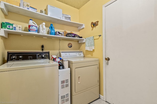 1710 Goliad Dr, Garland, TX 75042 - washroom with washing machine and dryer