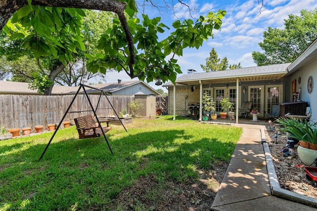 1710 Goliad Dr, Garland, TX 75042 - view of yard featuring a patio area
