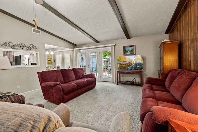 1710 Goliad Dr, Garland, TX 75042 - living room featuring a textured ceiling, light colored carpet, and a ceiling fan