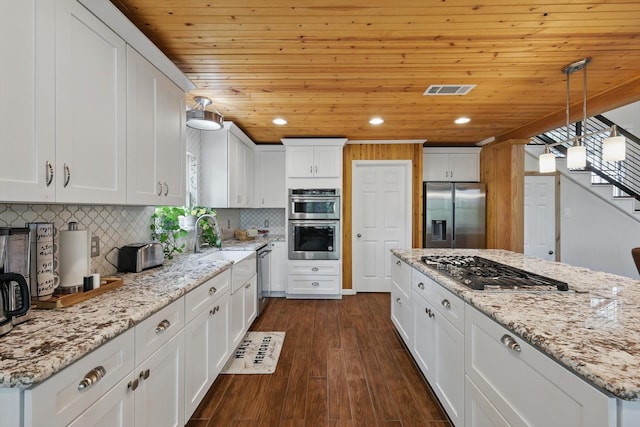 1520 Oakhurst Scenic Dr, Fort Worth, TX 76111 - kitchen featuring appliances with stainless steel finishes, a sink, white cabinets, wooden ceiling, and dark wood-type flooring