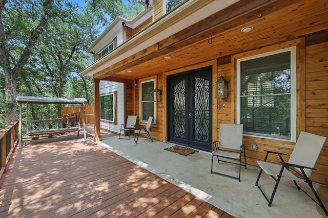 1520 Oakhurst Scenic Dr, Fort Worth, TX 76111 - entrance to property featuring french doors and a deck