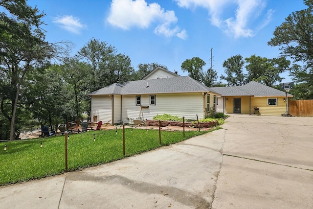1520 Oakhurst Scenic Dr, Fort Worth, TX 76111 - view of front of home featuring driveway and a shingled roof