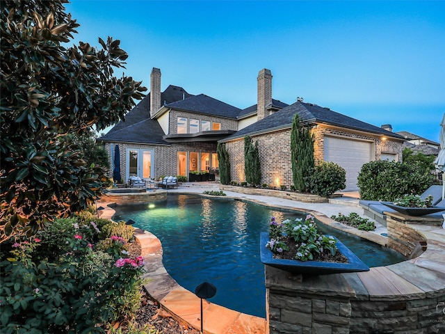 3421 Greenbrier Dr, Frisco, TX 75033 - view of pool with a pool with connected hot tub and a patio area