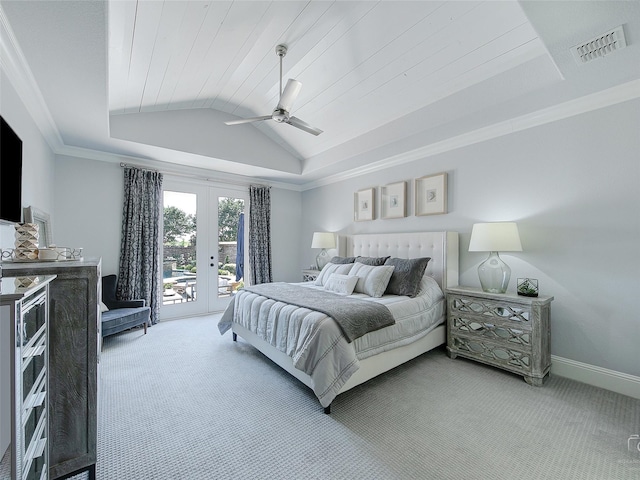 3421 Greenbrier Dr, Frisco, TX 75033 - bedroom featuring light carpet, access to outside, french doors, vaulted ceiling, and a tray ceiling