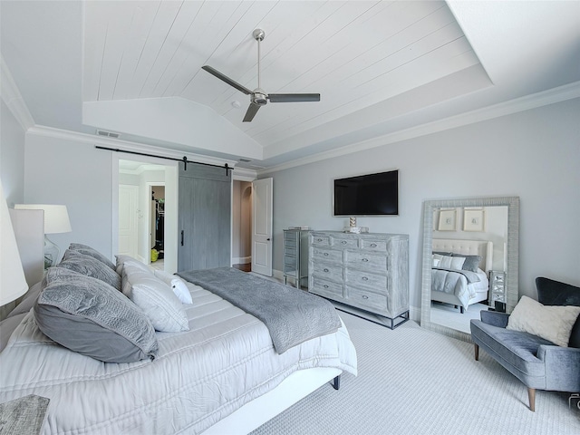 3421 Greenbrier Dr, Frisco, TX 75033 - carpeted bedroom with a barn door, vaulted ceiling, a spacious closet, a ceiling fan, and ornamental molding