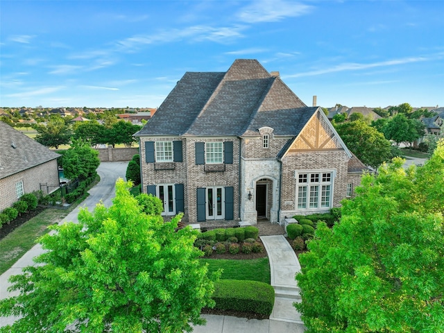 3421 Greenbrier Dr, Frisco, TX 75033 - view of front facade featuring french doors and brick siding