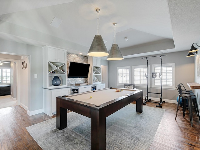 3421 Greenbrier Dr, Frisco, TX 75033 - playroom with baseboards, wood finished floors, billiards, and a tray ceiling