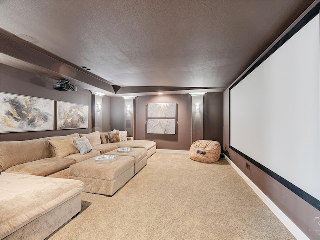 3421 Greenbrier Dr, Frisco, TX 75033 - carpeted cinema room featuring ornate columns, baseboards, and a textured ceiling