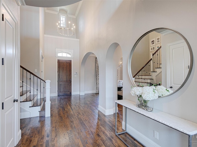 3421 Greenbrier Dr, Frisco, TX 75033 - entryway featuring stairs, a high ceiling, dark wood-style floors, baseboards, and healthy amount of natural light