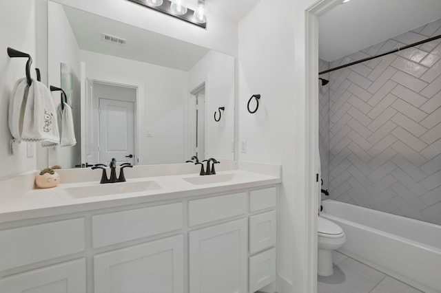 1301 Limestone Ridge Rd, Mansfield, TX 76063 - bathroom with double vanity, toilet, bathtub / shower combination, and tile patterned flooring
