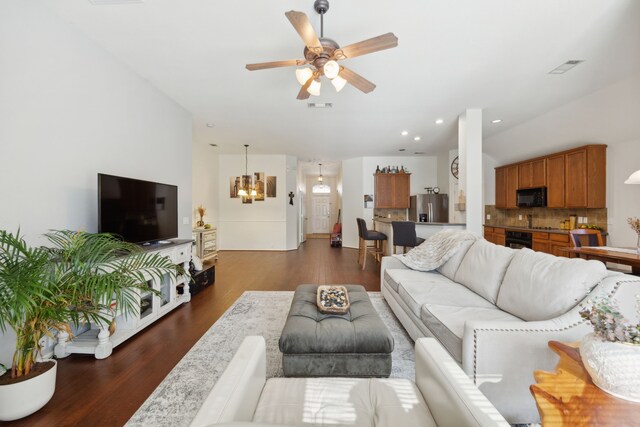 2748 Thorncreek Ln, Fort Worth, TX 76177 - living area with dark wood-style flooring, a chandelier, a ceiling fan, and recessed lighting