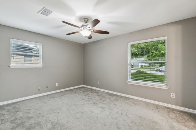 2140 Barbell Ln, Fort Worth, TX 76111 - unfurnished bedroom with carpet floors, attic access, baseboards, and ensuite bathroom