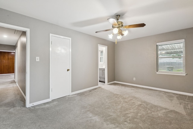 2140 Barbell Ln, Fort Worth, TX 76111 - empty room featuring carpet flooring, a ceiling fan, and baseboards