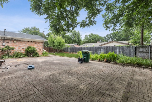 2140 Barbell Ln, Fort Worth, TX 76111 - fenced backyard featuring a patio area