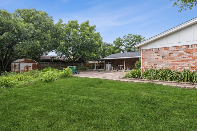 2140 Barbell Ln, Fort Worth, TX 76111 - view of yard featuring a patio