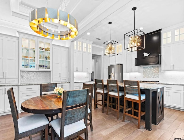 9035 Shallow Cv, Tyler, TX 75703 - dining room with ornamental molding, a chandelier, recessed lighting, and light wood-style flooring
