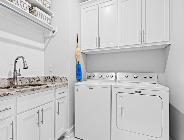 9035 Shallow Cv, Tyler, TX 75703 - laundry room with washer and dryer and cabinet space