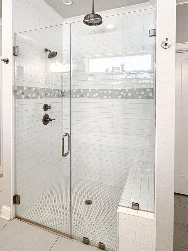9035 Shallow Cv, Tyler, TX 75703 - bathroom featuring a stall shower and tile patterned floors