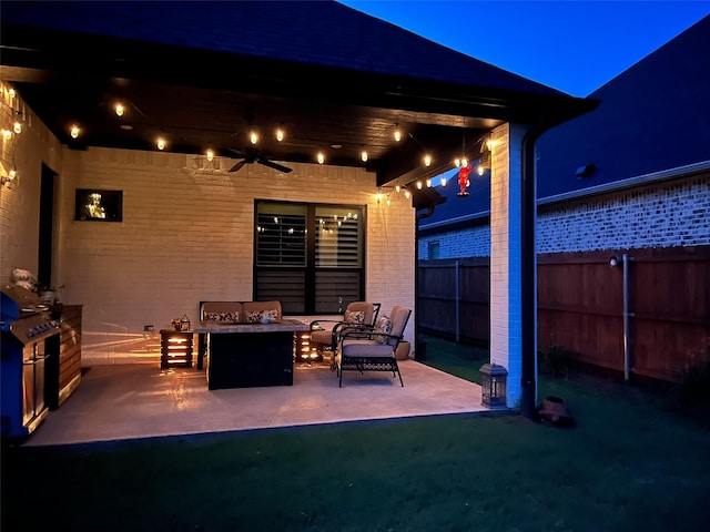 9035 Shallow Cv, Tyler, TX 75703 - patio at twilight with ceiling fan, a patio area, and an outdoor living space