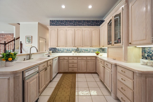 8005 Jefferson Cir, Colleyville, TX 76034 - kitchen featuring light brown cabinets, a peninsula, a sink, white dishwasher, and light countertops