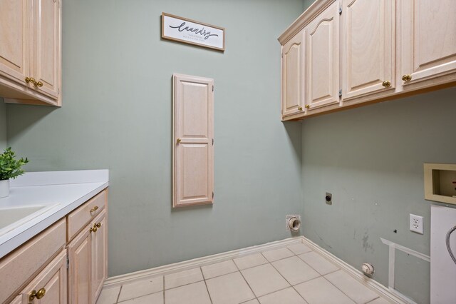 8005 Jefferson Cir, Colleyville, TX 76034 - laundry room featuring cabinet space, hookup for an electric dryer, washer hookup, gas dryer hookup, and baseboards