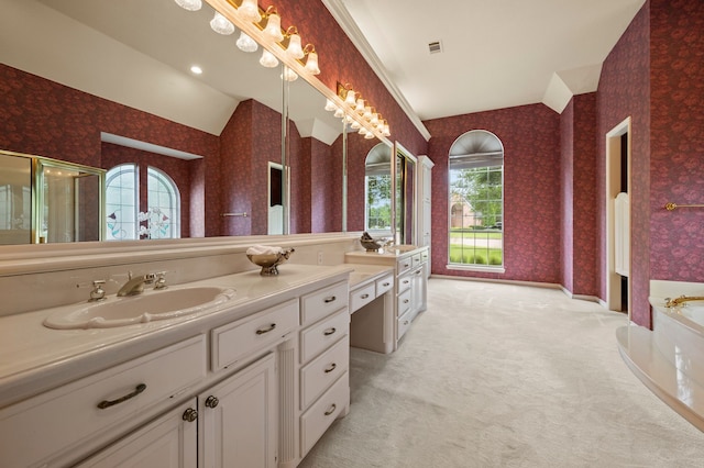 8005 Jefferson Cir, Colleyville, TX 76034 - full bathroom featuring vaulted ceiling, wallpapered walls, vanity, healthy amount of natural light, and a garden tub