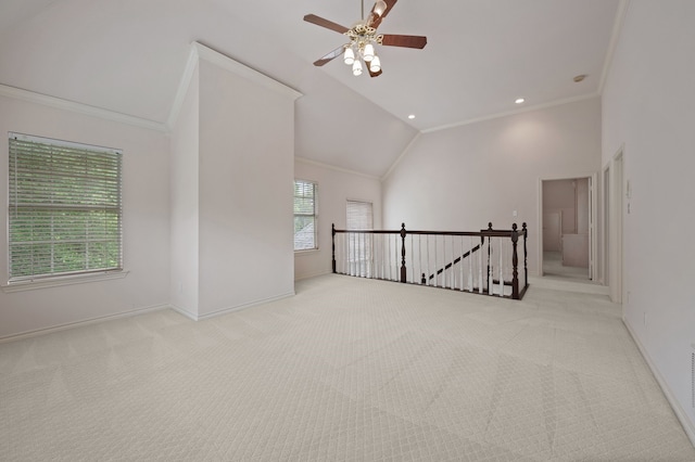 8005 Jefferson Cir, Colleyville, TX 76034 - spare room featuring lofted ceiling, ornamental molding, carpet floors, a ceiling fan, and baseboards