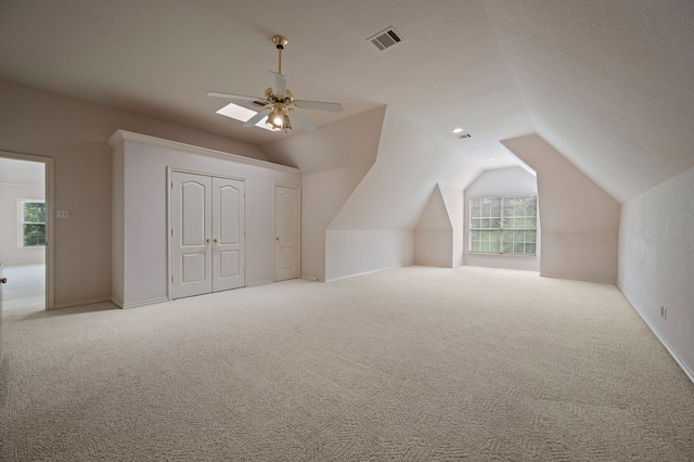 8005 Jefferson Cir, Colleyville, TX 76034 - bonus room featuring vaulted ceiling, ceiling fan, carpet floors, and baseboards