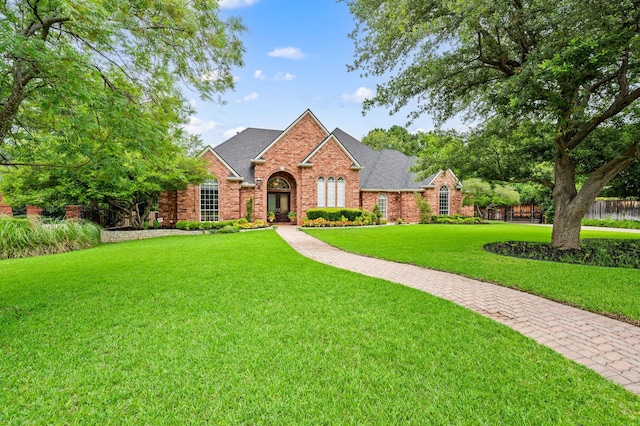 8005 Jefferson Cir, Colleyville, TX 76034 - traditional-style home featuring brick siding and roof with shingles