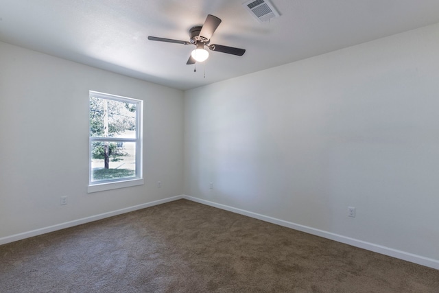 112 S Lakeview Dr, Lacy Lakeview, TX 76705 - unfurnished room with dark carpet, baseboards, and ceiling fan