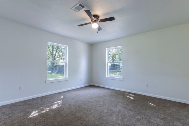 112 S Lakeview Dr, Lacy Lakeview, TX 76705 - spare room with dark carpet, baseboards, and a ceiling fan