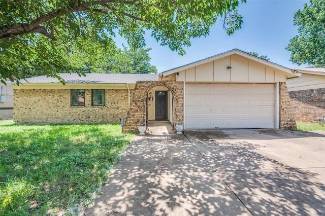 1709 Meadow Vly, Irving, TX 75060 - ranch-style house featuring driveway, brick siding, a garage, board and batten siding, and a front yard