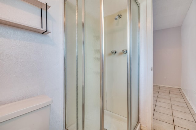 1709 Meadow Vly, Irving, TX 75060 - bathroom with a stall shower, toilet, and tile patterned floors