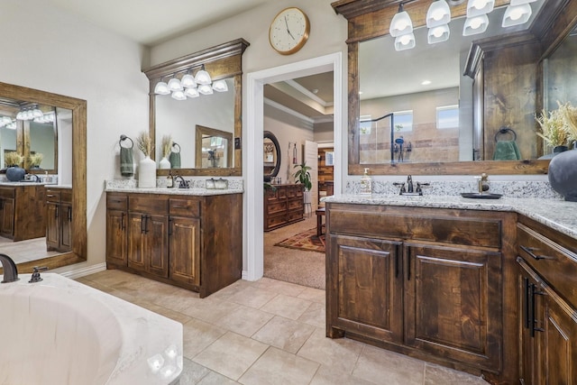 114 Piper Pkwy, Waxahachie, TX 75165 - full bath featuring two vanities, tiled shower, tile patterned flooring, a garden tub, and crown molding