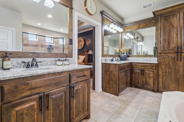 114 Piper Pkwy, Waxahachie, TX 75165 - full bath featuring vanity, a tile shower, tile patterned flooring, and recessed lighting
