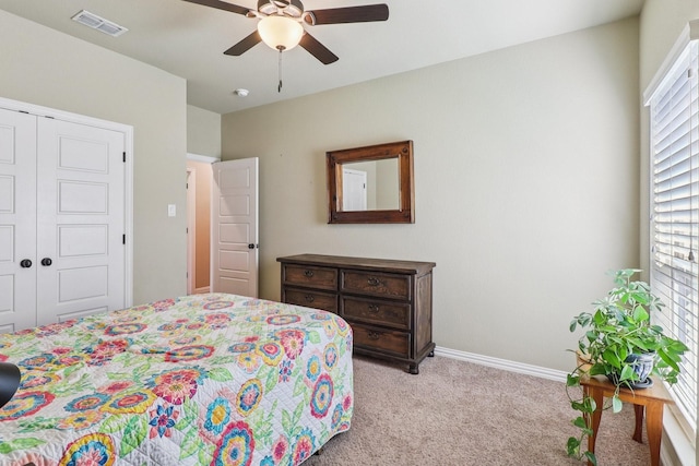 114 Piper Pkwy, Waxahachie, TX 75165 - bedroom featuring light carpet, a closet, baseboards, and a ceiling fan