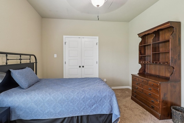 114 Piper Pkwy, Waxahachie, TX 75165 - carpeted bedroom with baseboards, a closet, and ceiling fan