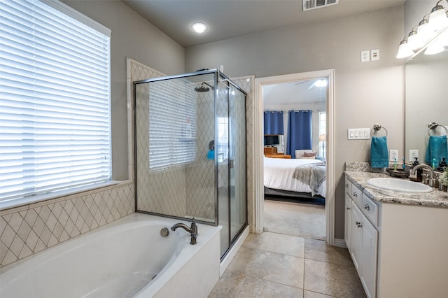 6312 Valley View Dr, Mckinney, TX 75071 - full bath with vanity, a bath, a stall shower, ensuite bathroom, and tile patterned flooring