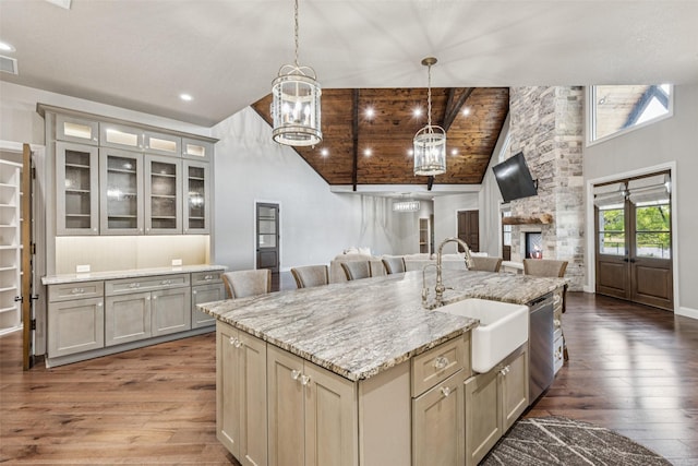 12877 Foutch Rd, Pilot Point, TX 76258 - kitchen with a chandelier, a sink, high vaulted ceiling, stainless steel dishwasher, and open floor plan