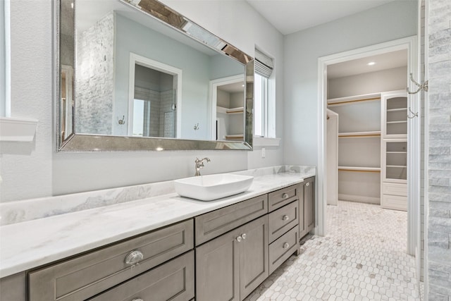 12877 Foutch Rd, Pilot Point, TX 76258 - bathroom featuring vanity and a spacious closet