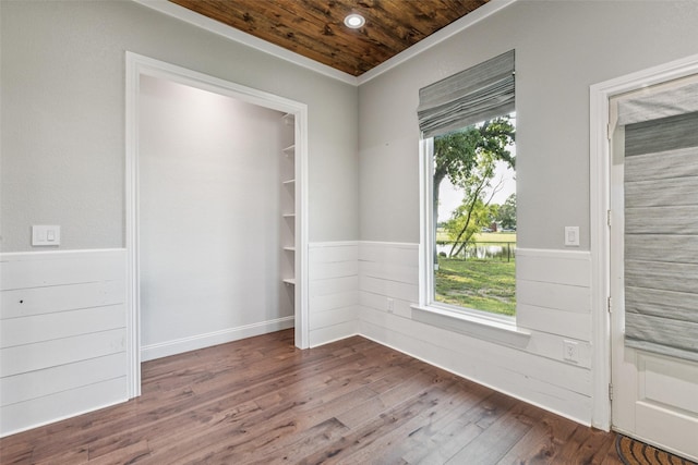 12877 Foutch Rd, Pilot Point, TX 76258 - spare room featuring wainscoting, dark wood-type flooring, wood ceiling, and wood walls