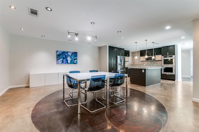 1201 Delmonte Cir, Plano, TX 75075 - dining room with baseboards, finished concrete floors, and recessed lighting