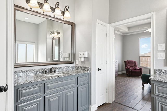 1207 Mae St, Anna, TX 75409 - bathroom with vanity, wood finished floors, and baseboards