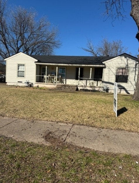 1517 Maple Dr, Garland, TX 75042 - ranch-style house with covered porch and a front lawn