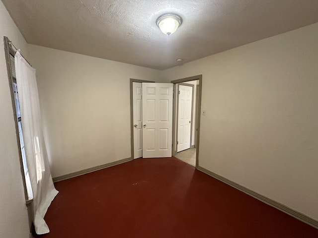 1517 Maple Dr, Garland, TX 75042 - empty room with baseboards