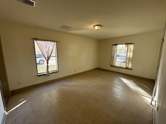 1517 Maple Dr, Garland, TX 75042 - empty room featuring baseboards