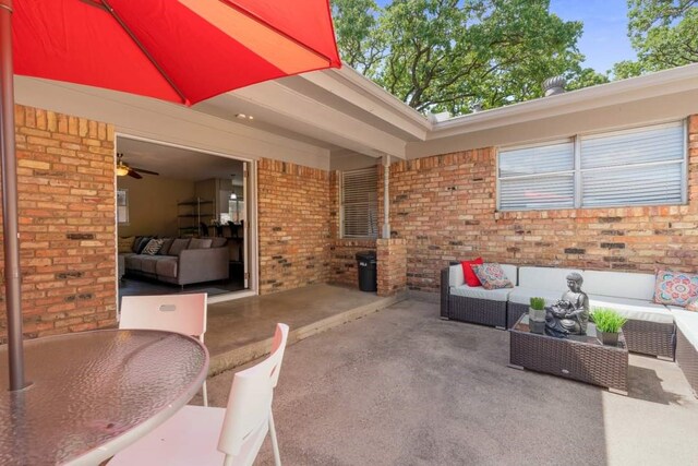 521 Brookview Dr, Hurst, TX 76054 - back of property featuring french doors, brick siding, a patio, and an outdoor hangout area