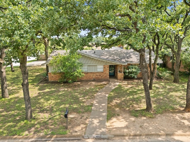 521 Brookview Dr, Hurst, TX 76054 - view of front of property featuring brick siding and a shingled roof