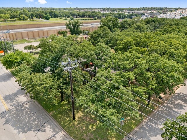 521 Brookview Dr, Hurst, TX 76054 - view of front of property featuring brick siding, a chimney, a front lawn, and roof with shingles