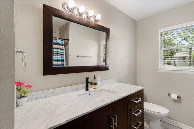 521 Brookview Dr, Hurst, TX 76054 - bedroom with carpet flooring, baseboards, and a ceiling fan